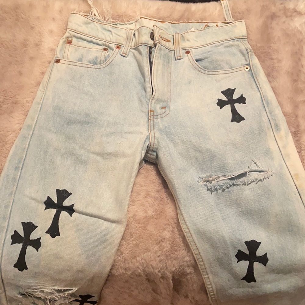 ✨bleached denim Levi’s jeans with black painted crosses✨